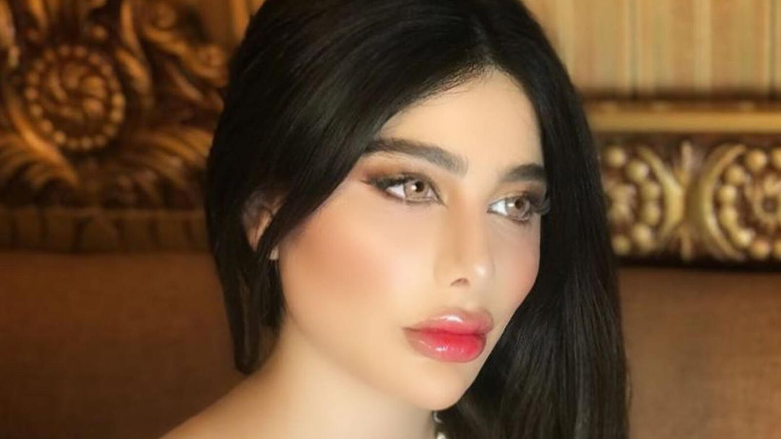Angie Khoury Covers Her Curves With Syrian Flag & Prays for Bashar Al
